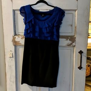 Form fitting is Byer dress. Size 9 black and blue